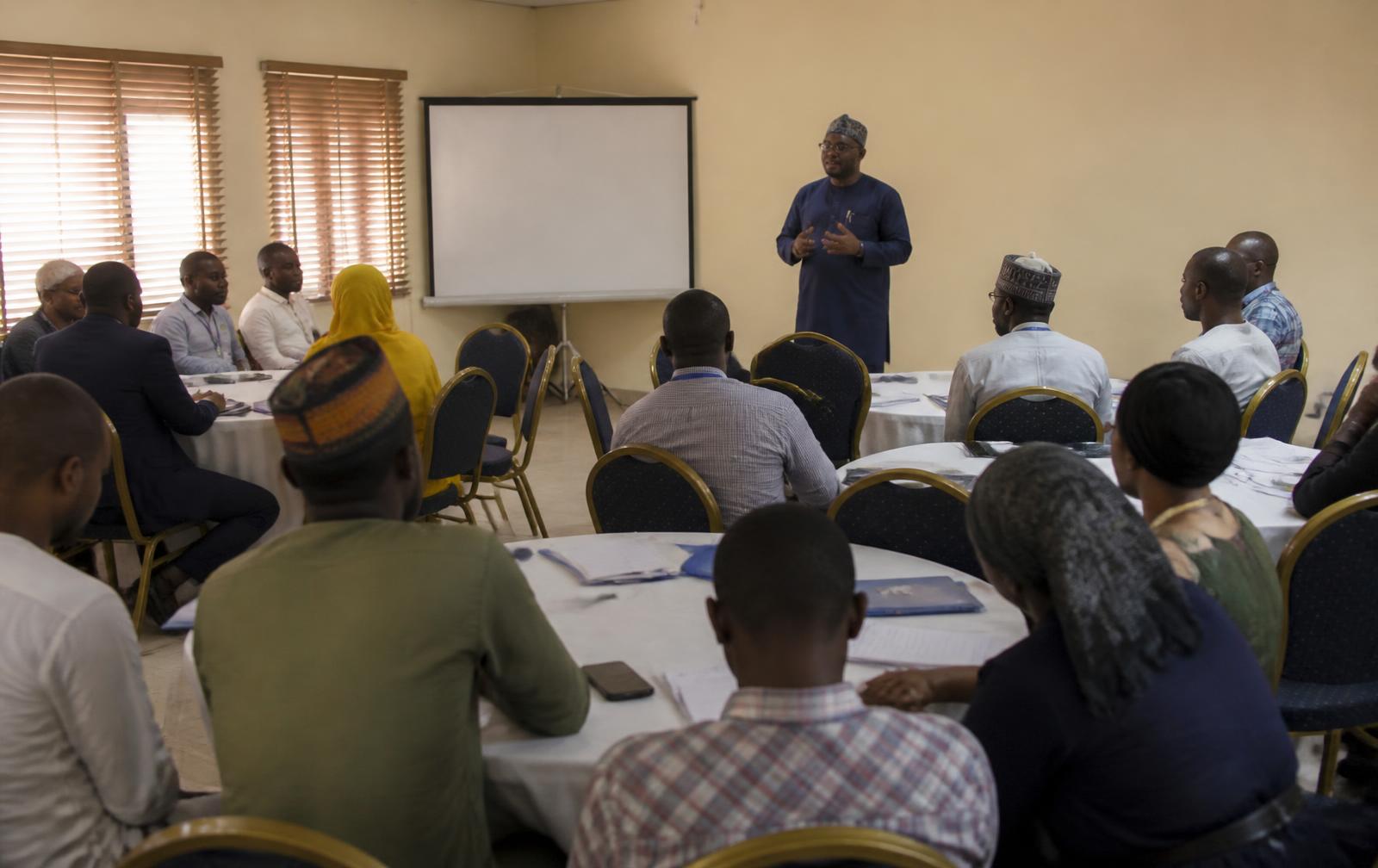 Facilitator addressing participants at a capacity-development workshop